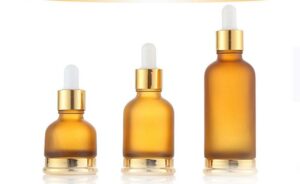 Chai tinh dầu thủy tinh có đầu hộp vàng chai đầu nhỏ bằng nhựa vàng thủy tinh mới nhất