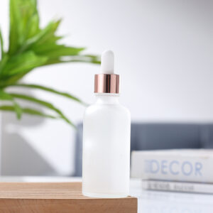 Lọ chiết tinh dầu mĩ phẩm vòng vàng hồng đầu nhỏ bằng nhựa trắng chai mờ thủy tinh mới nhất