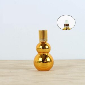 Chai tinh dầu thủy tinh hình kết quả bầu đôi mạ vàng xuyên biên giới mẫu mới nhất