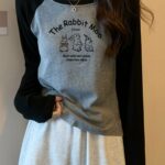 Áo thun nữ cotton tay dài họa tiết cho học sinh