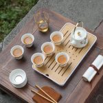 Bộ ấm chén trà du lịch gốm sứ họa tiết may mắn