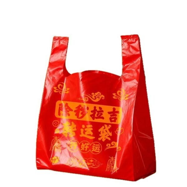 Túi đựng quần áo cũ màu đỏ có quai