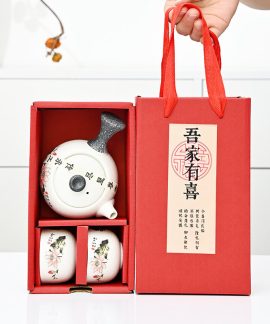 Bộ ấm trà tay bên men tuyết kèm hai hoặc bốn chén