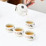 Bộ ấm trà tay bên men tuyết kèm hai hoặc bốn chén